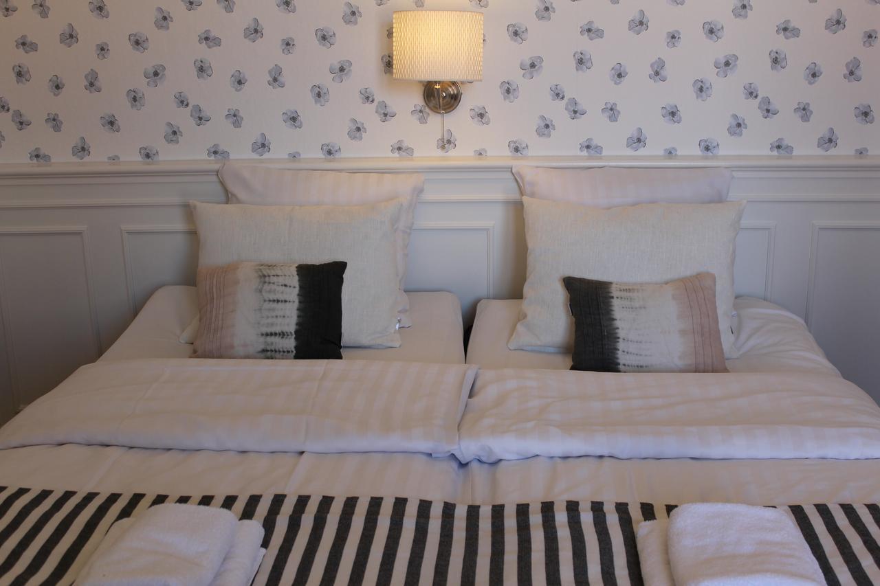 Hotel Pa Torvet แอเรอสเคอบิง ภายนอก รูปภาพ